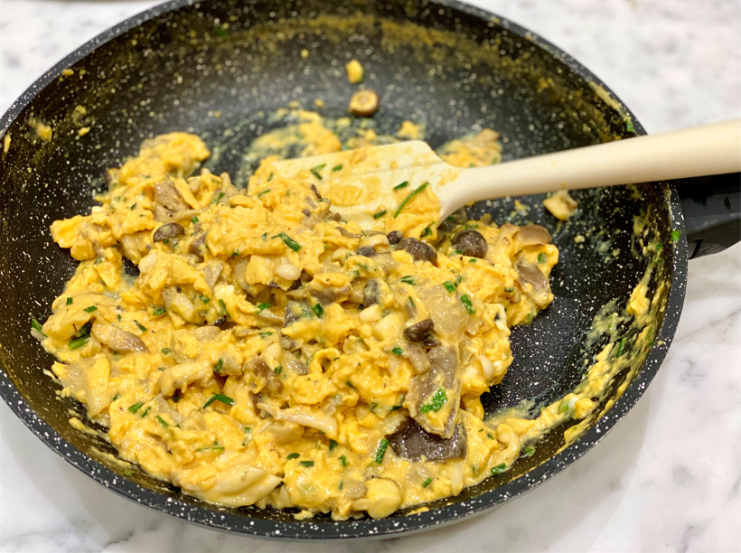 Egg and Mushroom scrambled in a pan. A brain-boosting recipe from Eat Burn Sleep.
